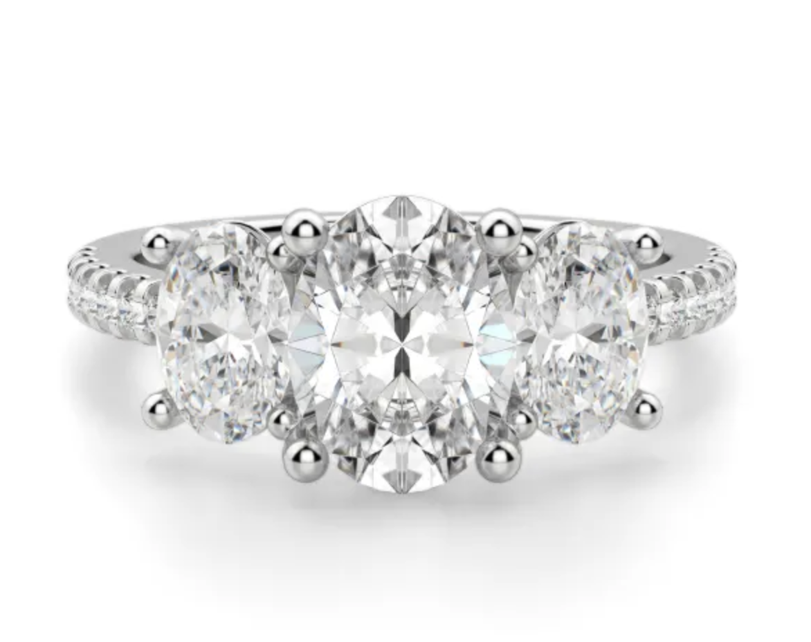 2.90 ctw. Three Stone Oval Cut Diamond Ring in a Diamond Pave Setting
